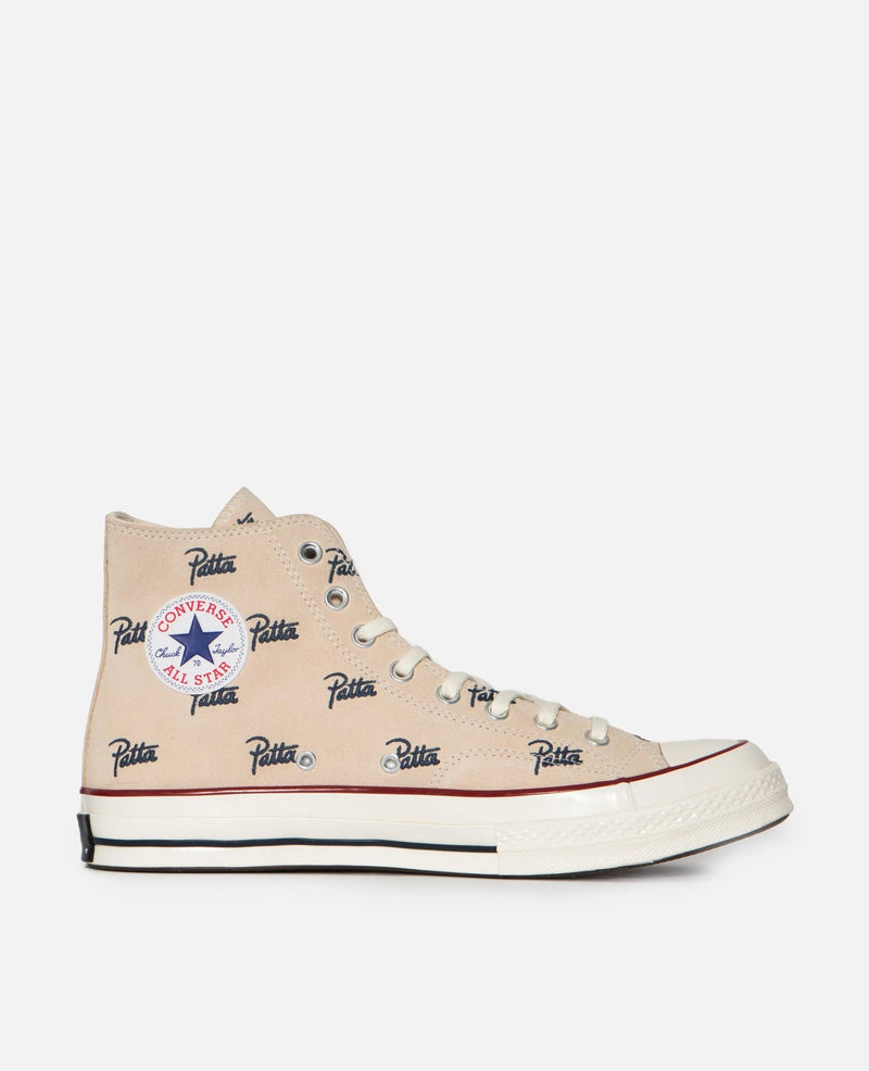 Patta x Converse Chuck 70 Hi sneaker in natural ivory canvas with all-over blue Patta script.